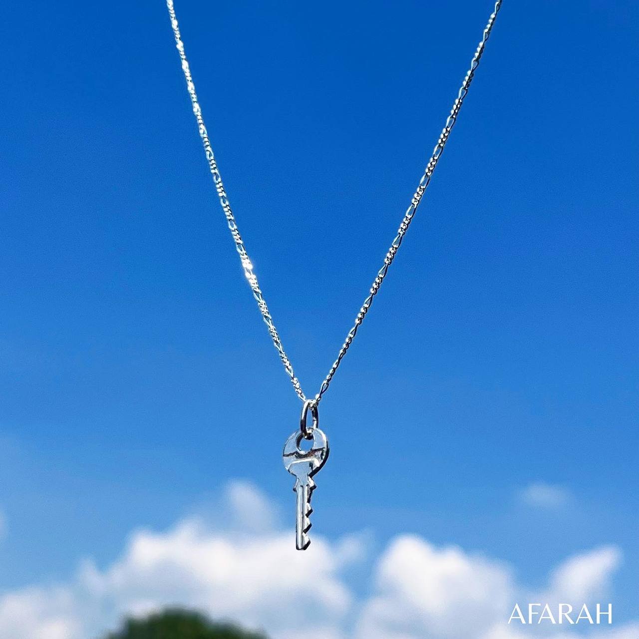 Cadena Figaro de Plata 0.925 con Dije de Llave